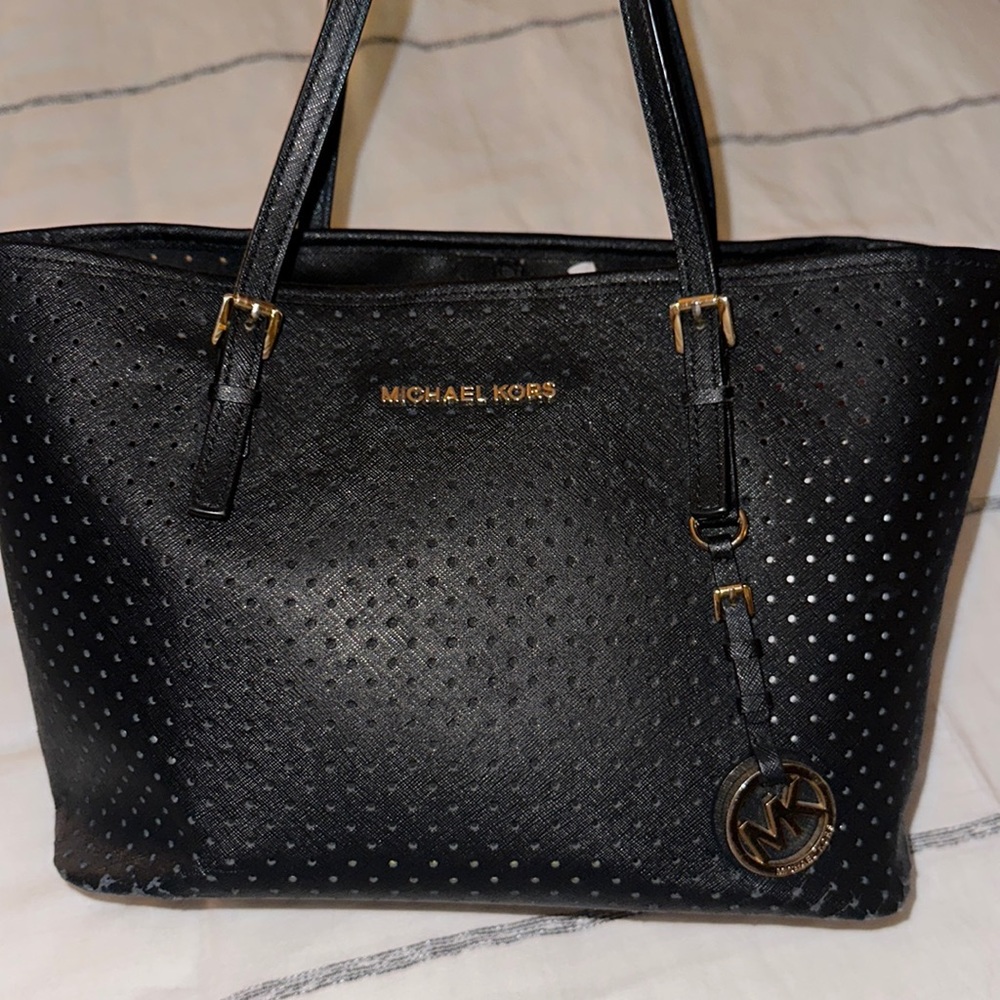 Michael Kors perforated black purse